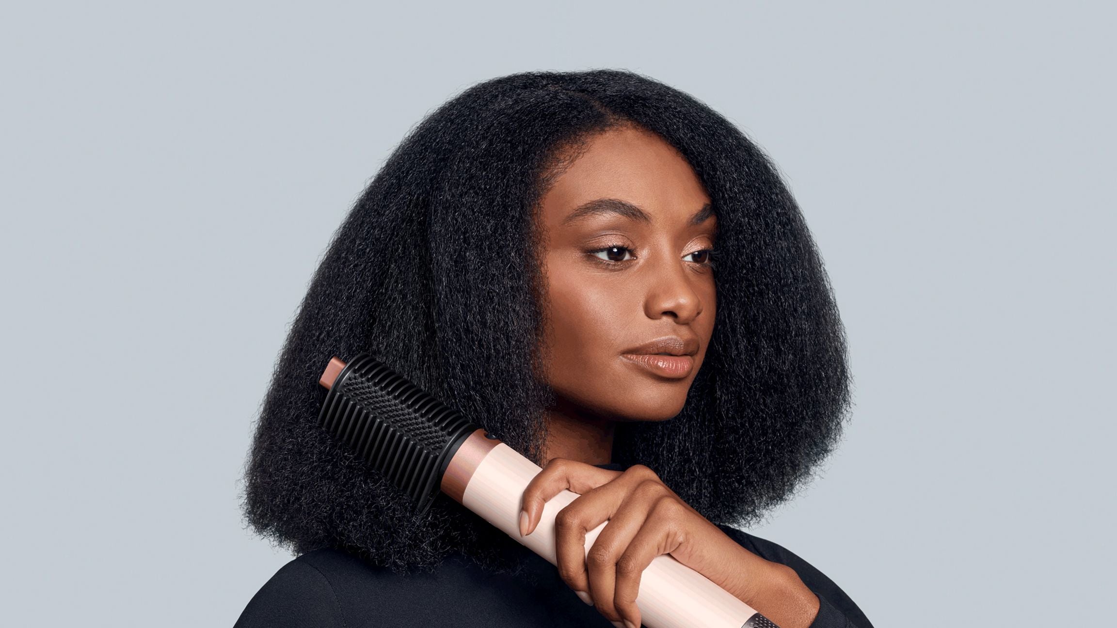 Multi-styler et Sèche-cheveux Dyson Airwrap Co-anda2x™ - cheveux bouclés à frisés (Rose Céramique)
